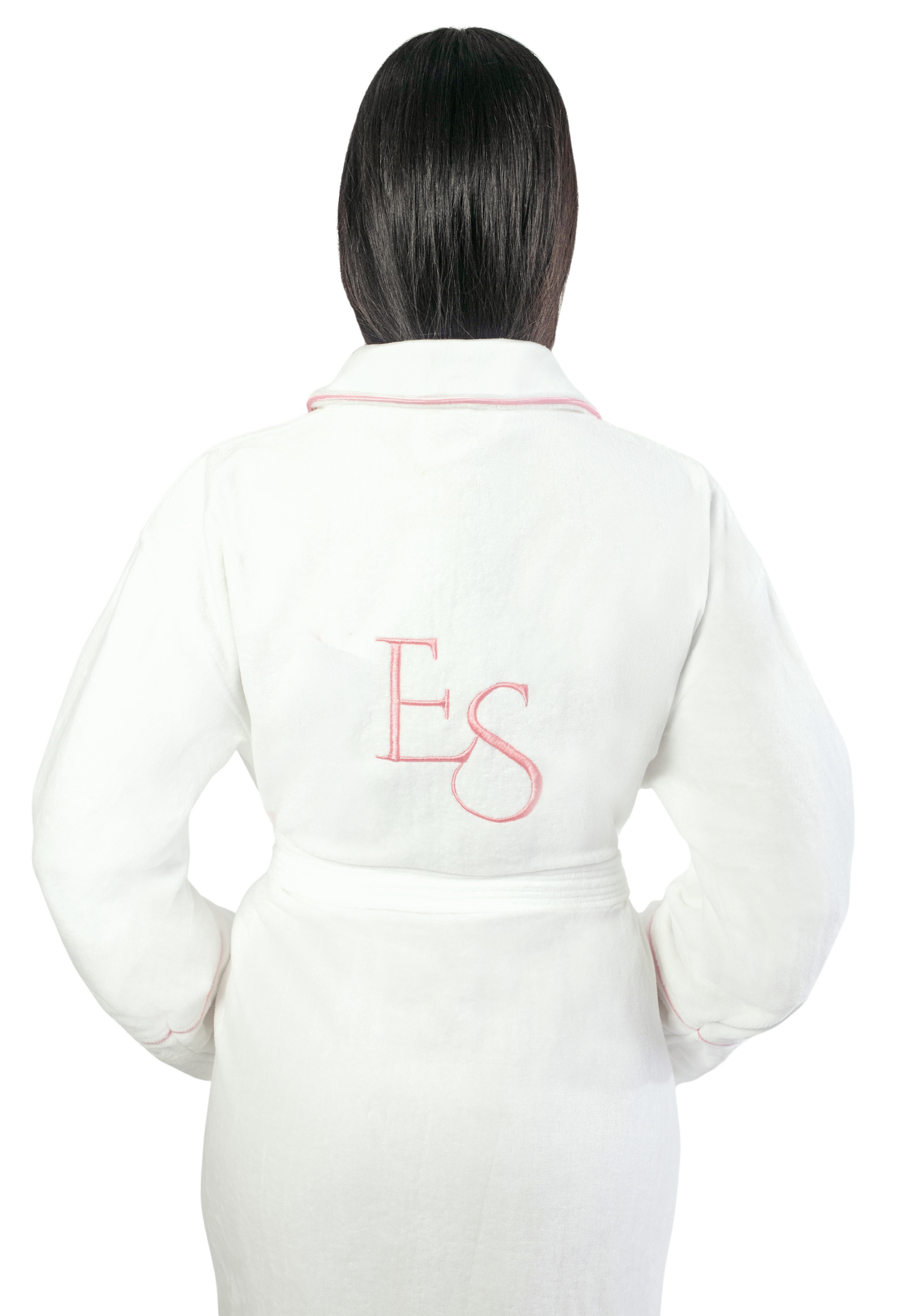 White bathrobe with pink Exotic Skn monogram on a white background