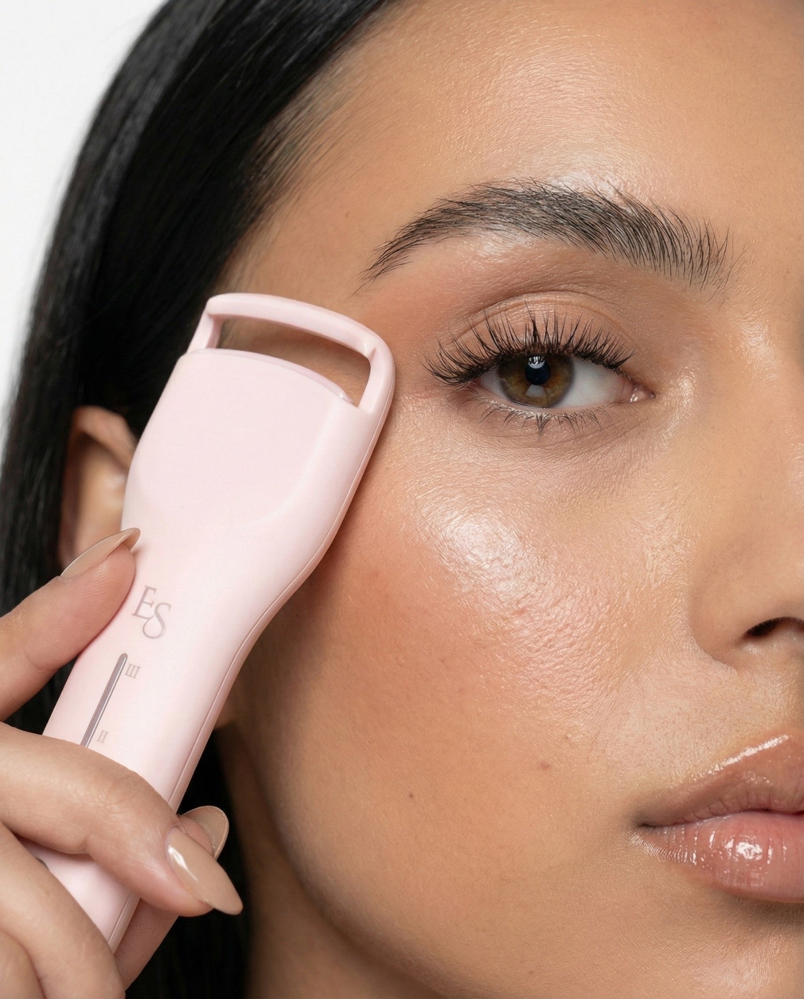 Lash Alchemy™ held beside lifted lashes